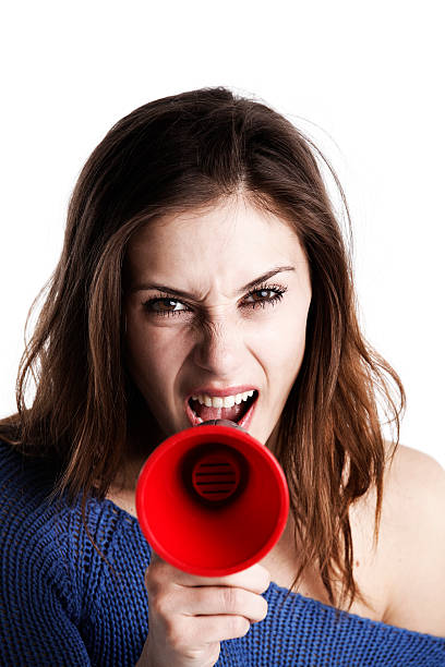 istock Woman screaming into megaphone 175380936