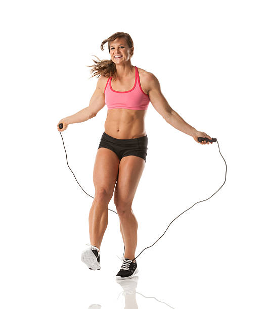 Woman jumping with rope