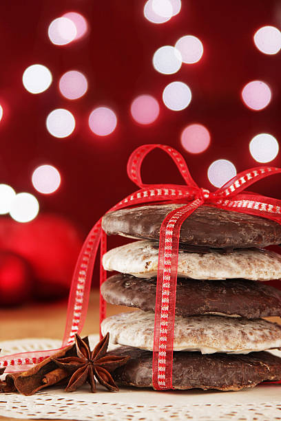 istock Christmas cookies with red bow and Christmas lights 175382060