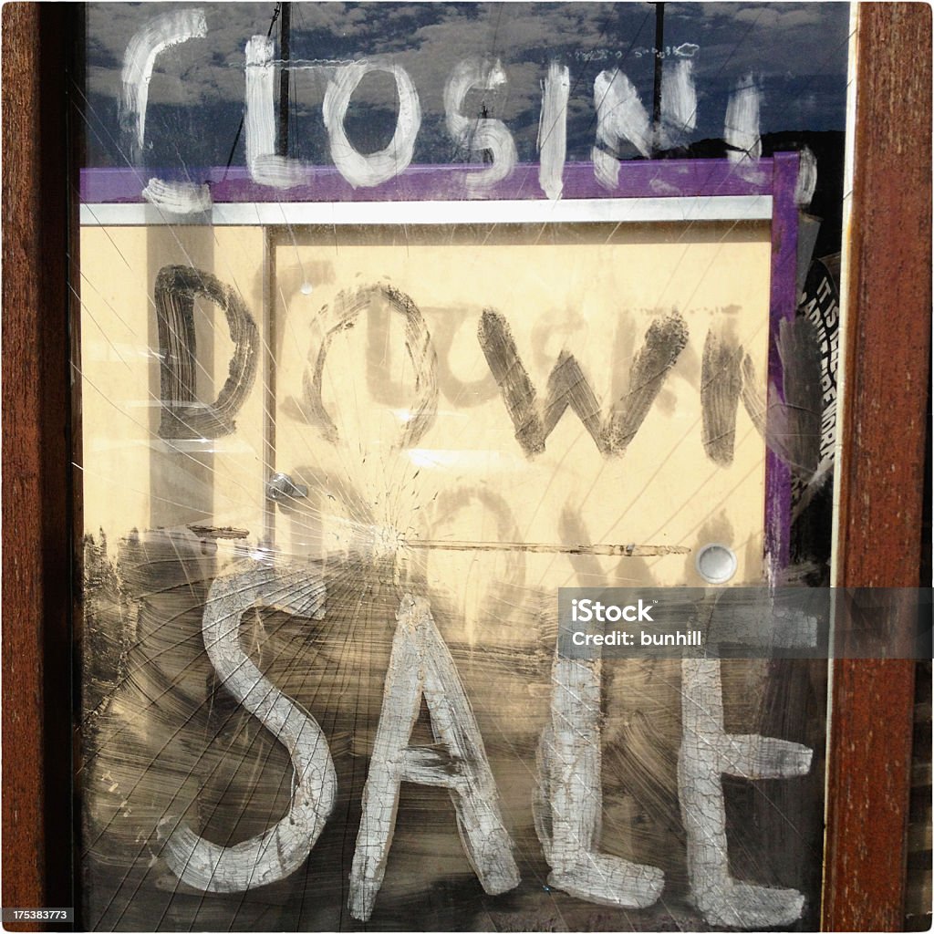 closing down sale - retail recession shop window Image captured using '645 Pro' app on iPhone 4S.closing down sale - shattered shop window Economic Depression Stock Photo