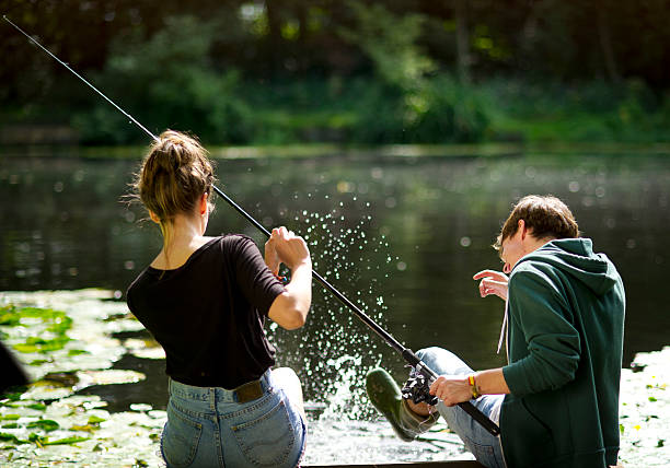 istock soaked youngsters fishing and splashing 175384111