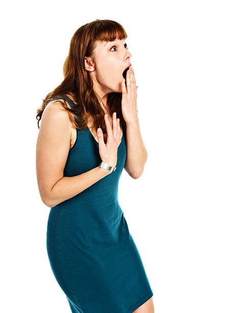 istock Beautiful young redhead is shocked and amazed by something 175384220