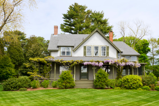 A beautiful country home in the Queen Anne style of greek revival architecture near Cape Cod in New England.