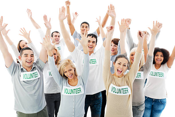 istock Group of cheerful volunteers with their hands up. 175385122