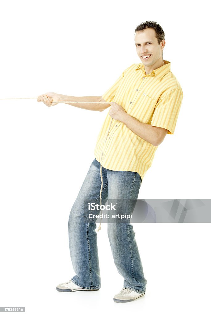 Pulling Man Pulling Something Stock Photo - Download Image Now - 25-29 Years ...
