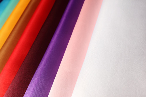 Rolls of silk in different colors.