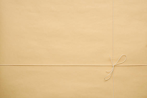 Overhead shot of brown package with tied string.