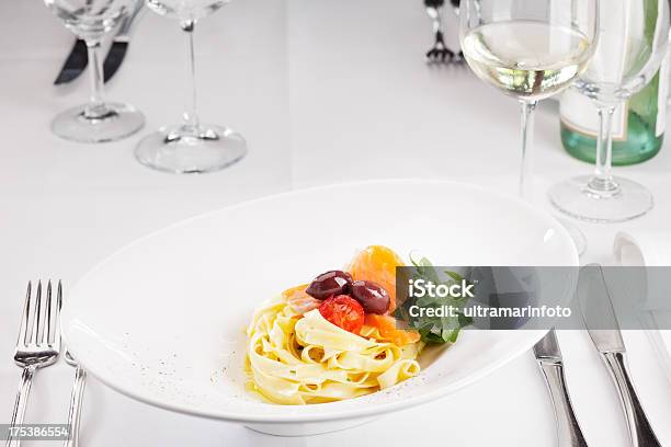 Pasta With Raw Salmon Olives And Cherry Tomato Stock Photo - Download Image Now - Cherry Tomato, Close-up, Color Image