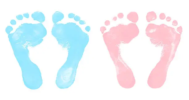 Photo of Baby Boy and Girl Footprints