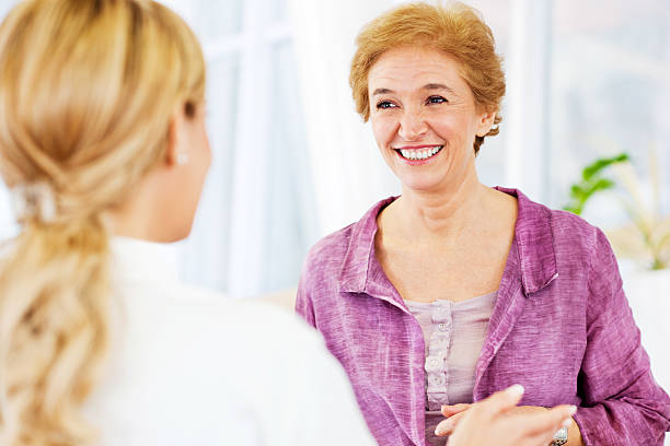 istock Mature woman with her doctor. 175386821