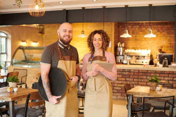 istock coffee shop start up couple 1753868422