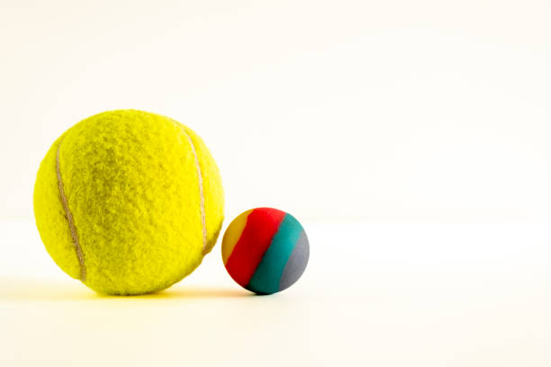 istock Rubber ball of various colors on a keyboard. 1753874059