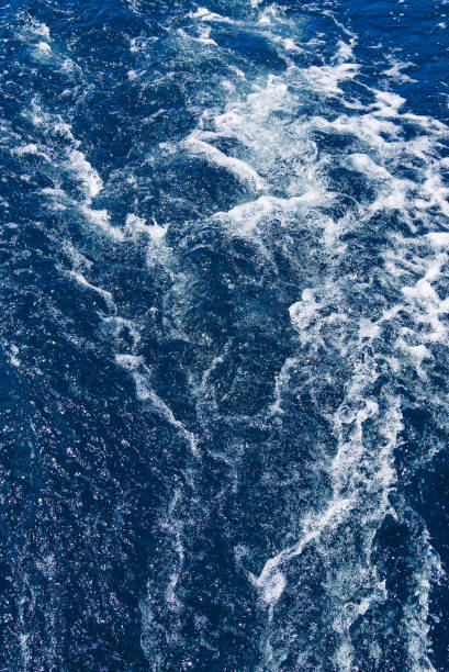 istock Abstract blue sea water with white waves. Blue sea texture with waves and foam. Mediterranean sea 1753875466