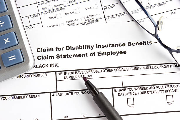 Disability insurance claim form stock photo