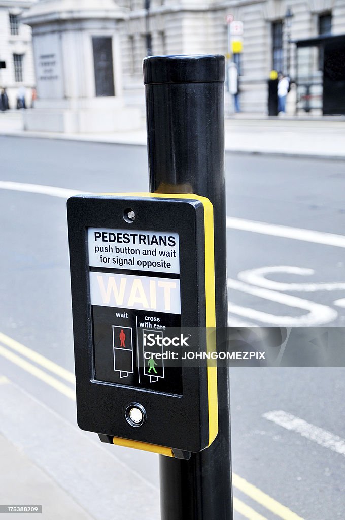 Pedestrian Crossing Unit Pedestrian crossing unit attached to a black metal post on a London street. UK Stock Photo