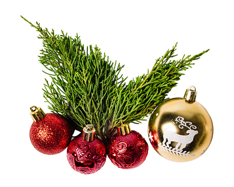 Christmas pine branches and ornaments balls, isolated on white or transparent background cutout.