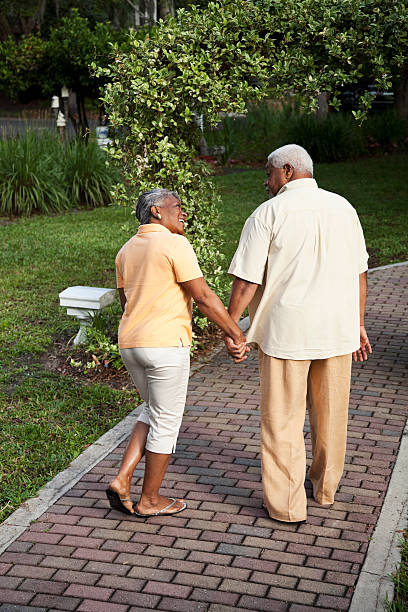 istock Senior African American couple walking, holding hands 175388607