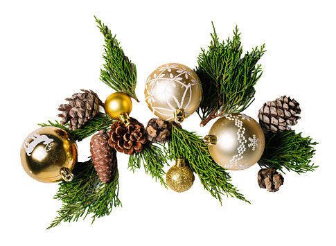 Christmas pine branches and ornaments balls, isolated on white or transparent background cutout.