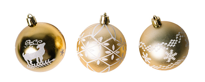Gold Ornamental Christmas balls, isolated on white or transparent background cutout.