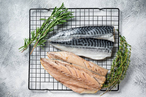 Fresh sliced mackerel fillet fish. White background. Top view