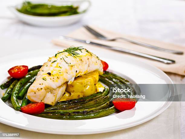 Panfryed Monkfish Tail With Vegetables Plated Formally Stock Photo - Download Image Now