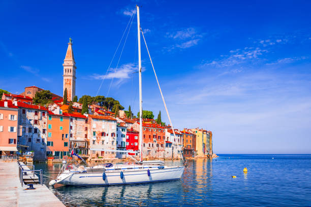 Rovinj, Croatia. Old town harbor, sunny day with blue sky. Adriatic Sea, Dalmatia coastline, Istria. stock photo