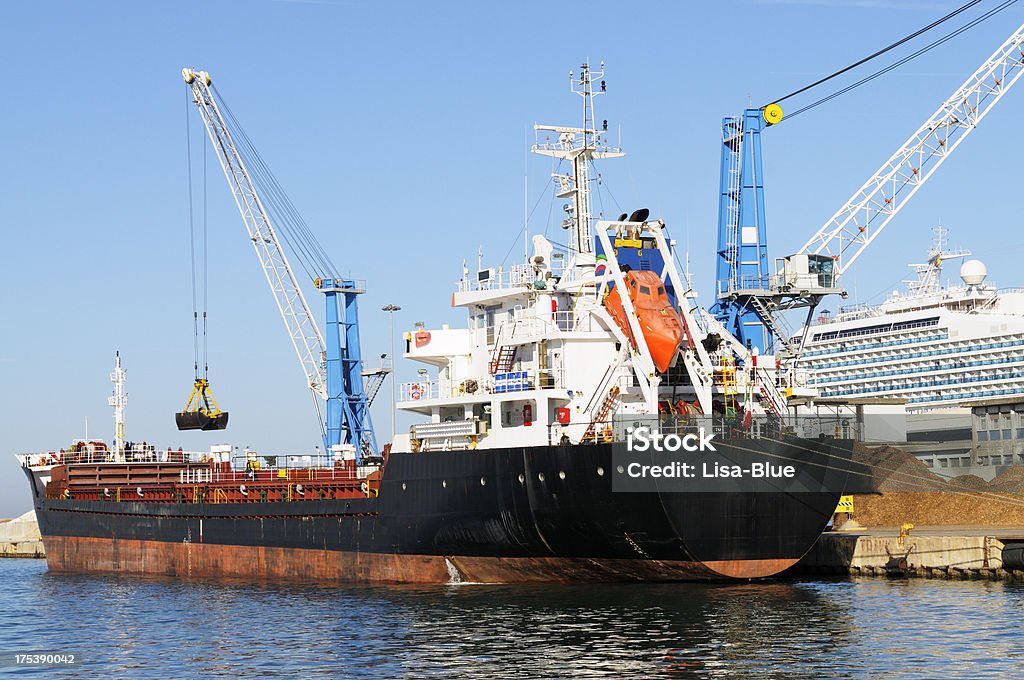 Cargo Ship Loading Cargo ship loading Barge Stock Photo