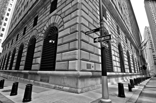 Federal Reserve Bank of New York, Nassau & Liberty Streets, built c.1922-1924 in the fortress like Romanesque Revival style.  Lower Manhattan Financial District, New York City.