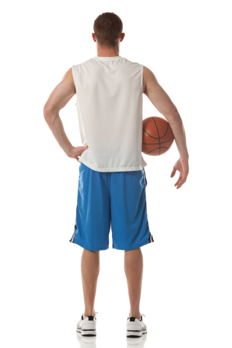 Rear view of sportsman holding a basketball