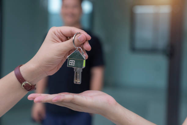 istock Hand receiving keys from new own property 1753904713