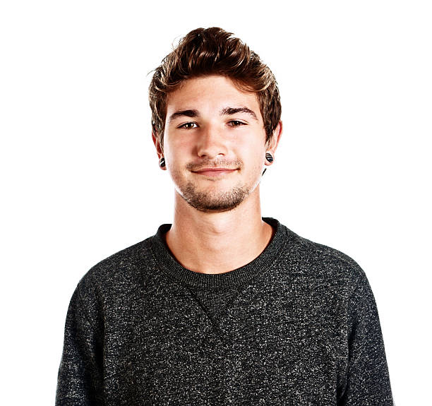 istock Portrait of cute smiling young man 175391101