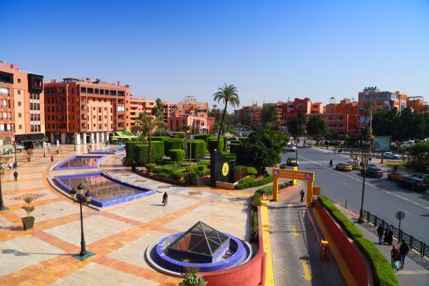 People visit Jardin 16 Novembre square in Gueliz district of Marrakech city, Morocco.