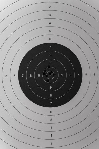 istock Paper target with holes from the bullets 1753916405