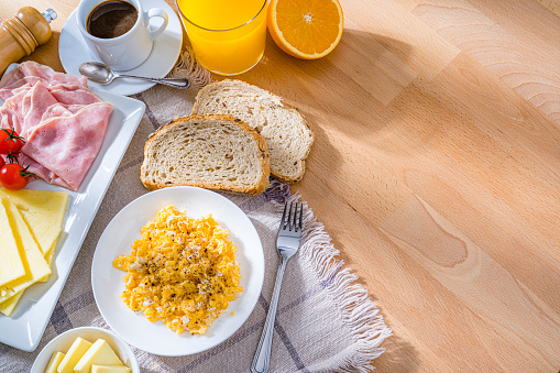Breakfast with Sunny side up eggs, sausage, hash browns and toast-Photographed on Hasselblad H3D-39mb Camera