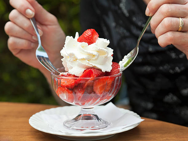 istock strawberries and whipped cream 175392823