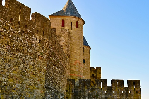 Carcassonne, France: 10/07/2023- The Cite de Carcassonne, is a hilltop medieval walled city in southern France’s Languedoc region. It is famous for The Carcassonne Cathedral and the many watchtowers and double-walls surrounding the buildings.