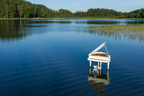 Grand Piano on the lake surface.