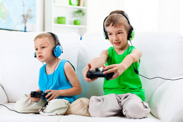 istock Children playing video games 175394951