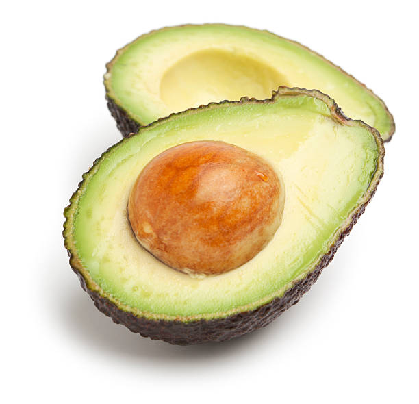 авокадо половинки - avocado portion fruit isolated стоковые фото и изображения
