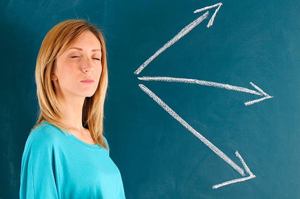 istock Pensive Woman and Arrow Sign 175395843