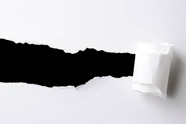 прямоугольник отверстие в белой бумаги на черном фоне - cut or torn paper paper torn curled up стоковые фото и изображения
