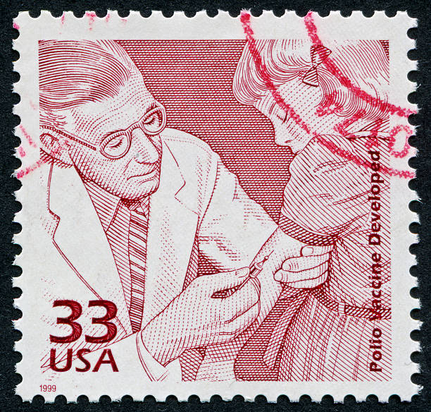 Polio Vaccine Stamp Cancelled Stamp From The United States Of America Commemorating The Development Of The Polio Vaccine polio virus photos stock pictures, royalty-free photos & images
