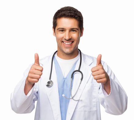 Portrait of a cheerful young doctor gesturing thumbs up. Horizontal shot. Isolated on white.