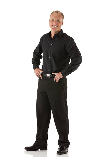istock Happy businessman standing with his arms akimbo 175396480