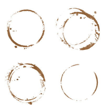 Four coffee cup stains isolated on white