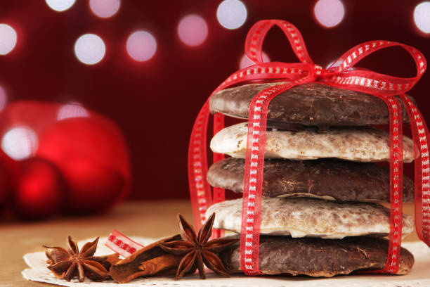 German Christmas cookies with red bow and Christmas lights stock photo