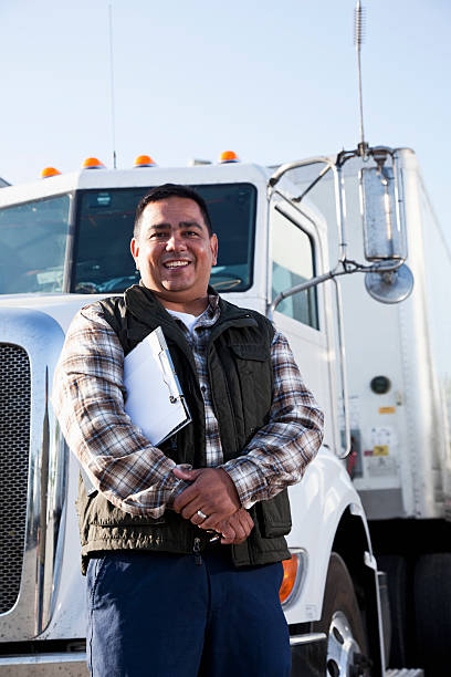 istock Hispanic truck driver with clipboard 175397039