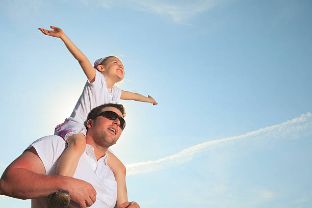 istock Ocean Sky - Dad Daughter Hand Over 175397281