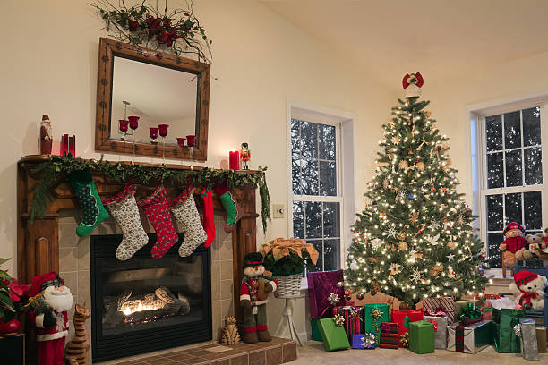 Christmas Morning The house is all decorated and the packages are ready!  poinsettia christmas candle flower stock pictures, royalty-free photos & images