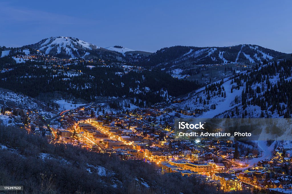 Dusk View of Park City Glowing Dusk View of Park City Glowing.  Scenic village from above with cool blue dusk light and glowing warm lights.  Dusk View of Park City Glowing with lights.  Captured as a 14-bit Raw file. Edited in 16-bit ProPhoto RGB color space. Park City - Utah Stock Photo